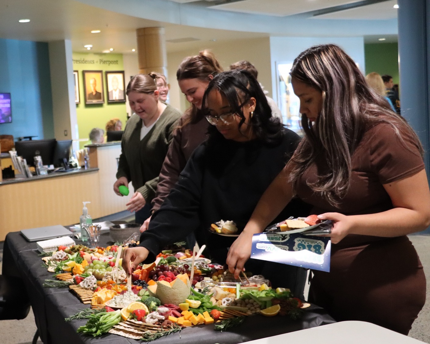 Students enjoy a charcuterie spread during Pierpont Community & Technical College’s First-Gen Proud Celebration on Nov. 6 in the Advanced Technology Center lobby. The event was part of First-Generation College Celebration Week and highlighted resources and community for first-generation students.