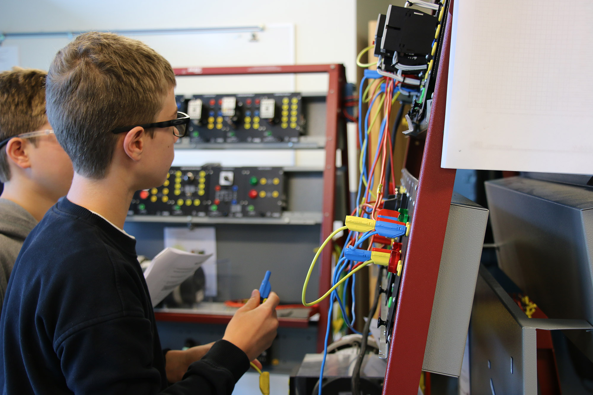 Students work with electrical and automation systems during Pierpont Community & Technical College’s SparkForce Summer Camps, gaining hands-on experience with equipment used in modern manufacturing.